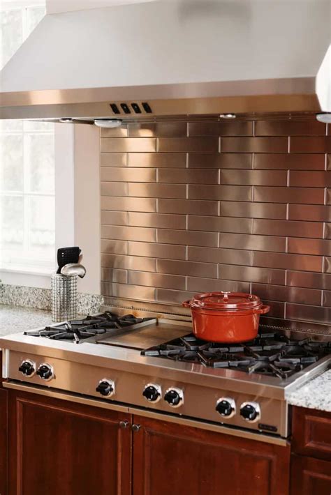 sheet metal backsplash behind stove